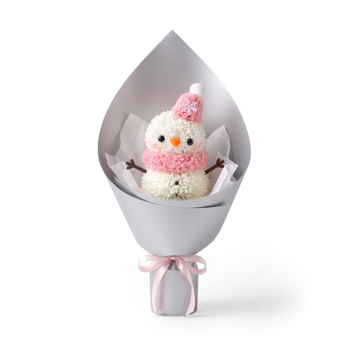 Winter Snowman Pompon Bouquet made of fresh white pompon chrysanthemums. This Christmas floral arrangement features a snowman with a pink hat and pink scarf, wrapped in silver paper.
